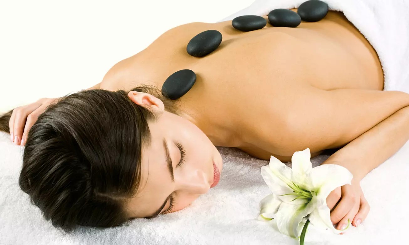 Rejuvenate at Just Yu Massage: Hot Stone Foot or Full-Body Massage for One or Two