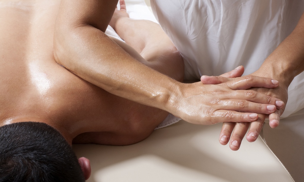 Deep Tissue, Swedish, Sports Stretch, or Foot Reflexology Massage at Soothing Touch – Up to 40% Off