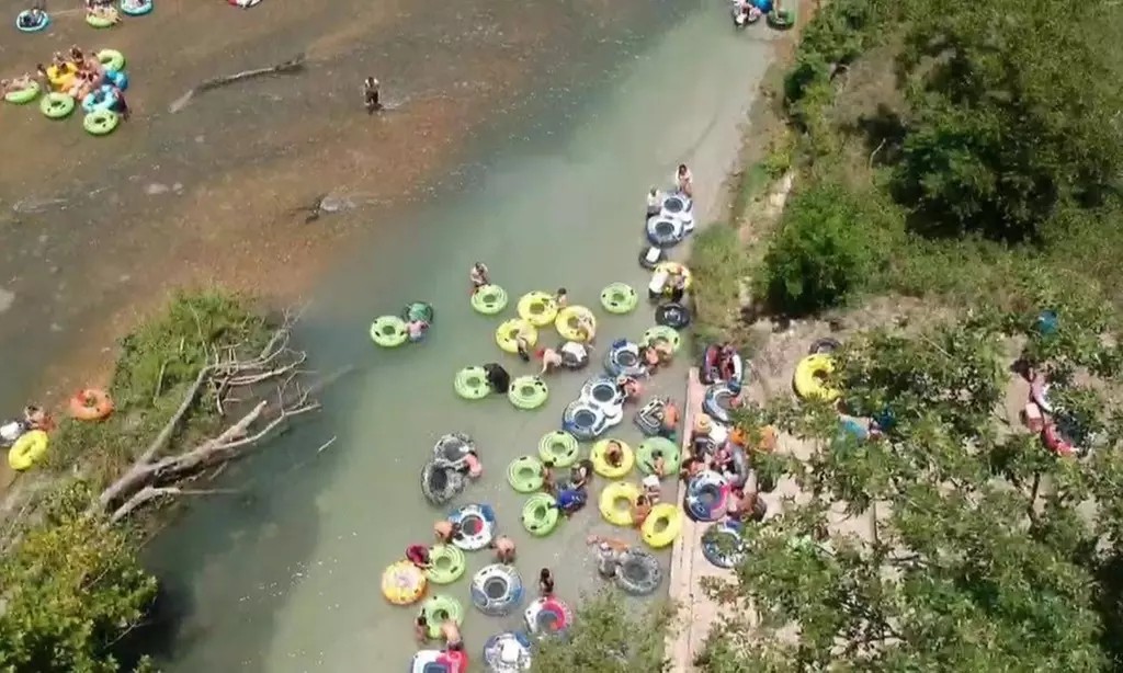 Tube in Style! Hassle-Free River Fun with Transport & Cooler – Save Up to 37%