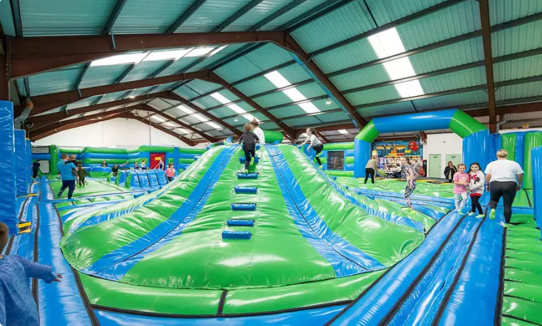 Bounce, Slide & Play | 90-Min Inflatable Park Experience for Groups of Up to 4