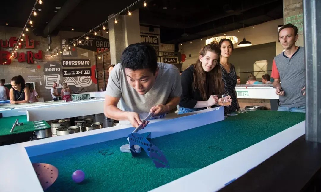 Enjoy One Round of Mini Golf, Duffleboard & Drinks for Two or Four at Flatstick Pub – Up to 47% Off